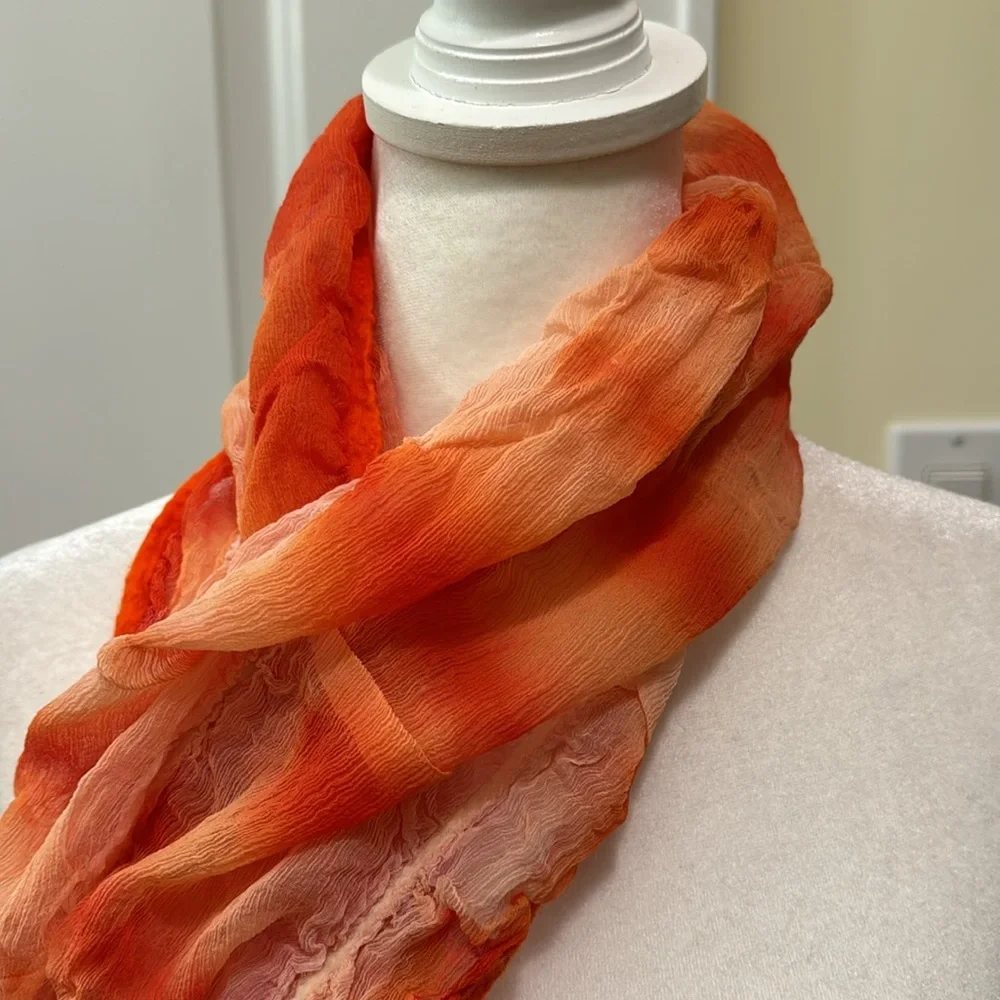 Vintage Masino Silk and Wool Crinkle Scarf in vibrant orange hues.